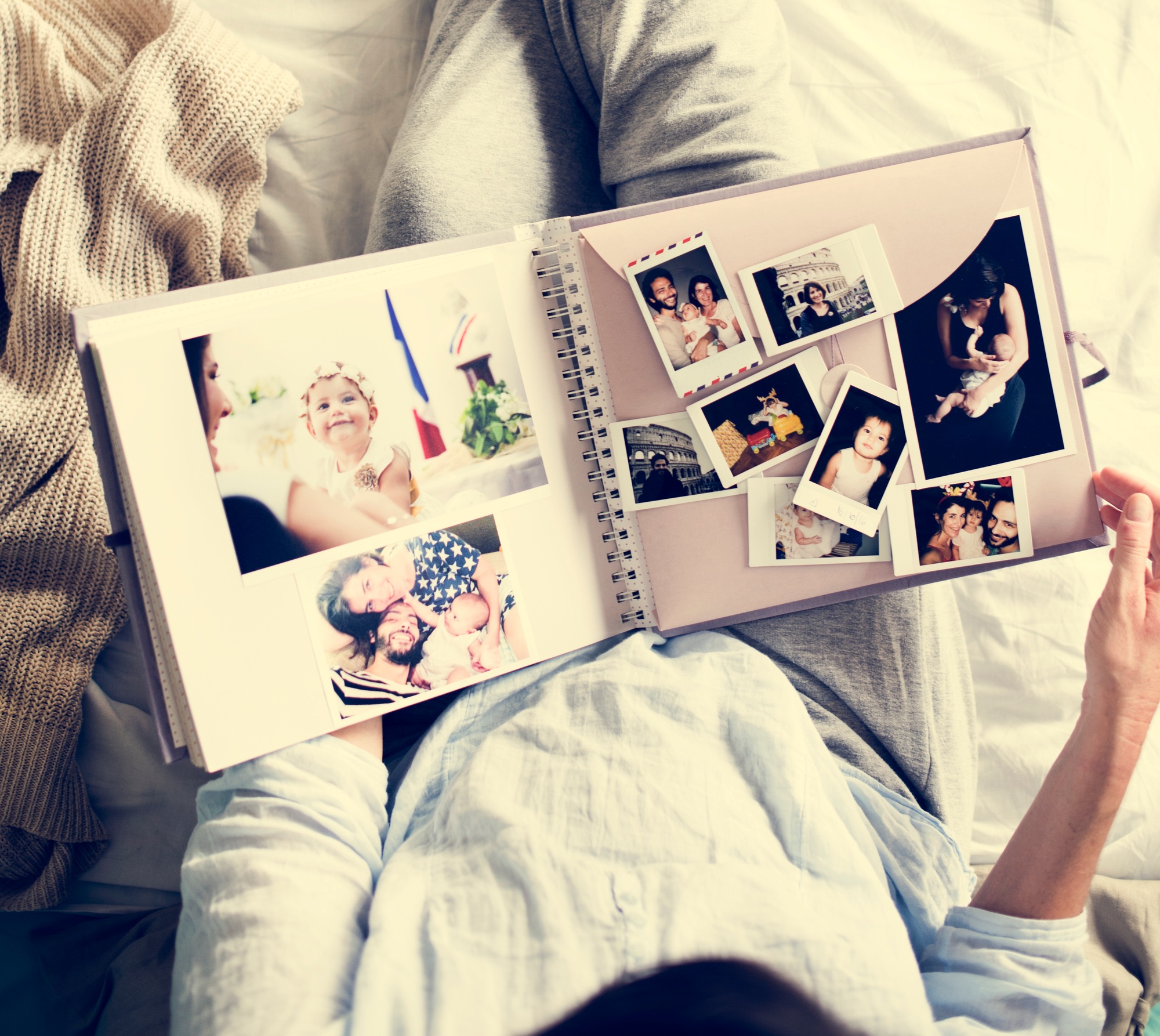 Mother looking memories photo album